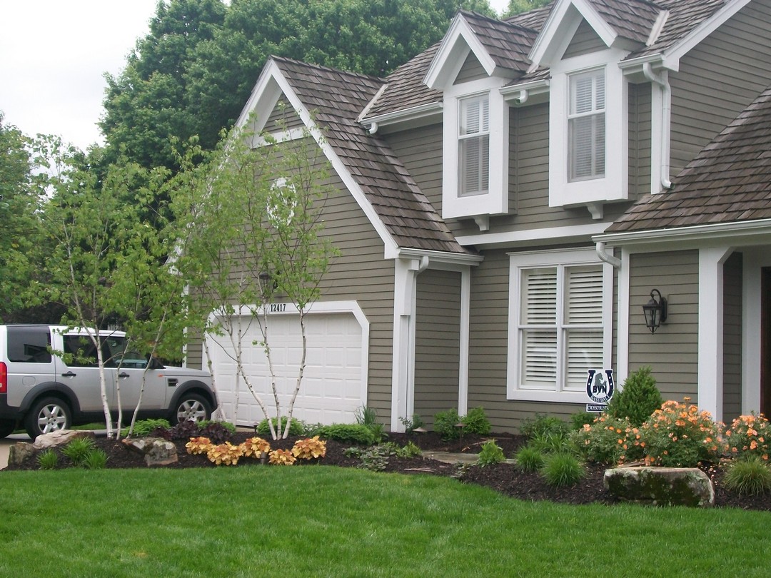 a picture of a house after Aspen's verticutting service in Overland Park KS